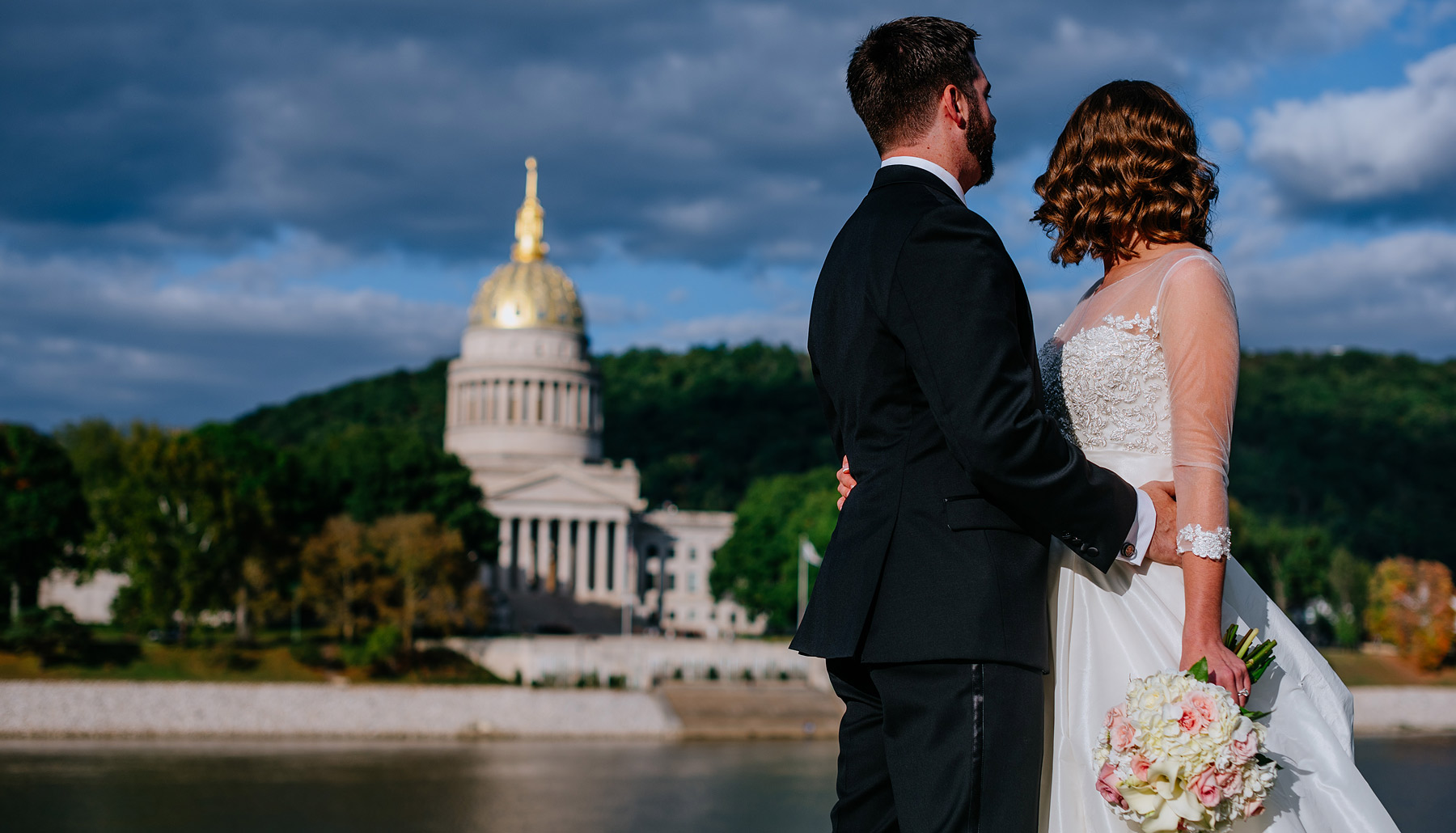 bride and groom overlook wv state capitol gold dome