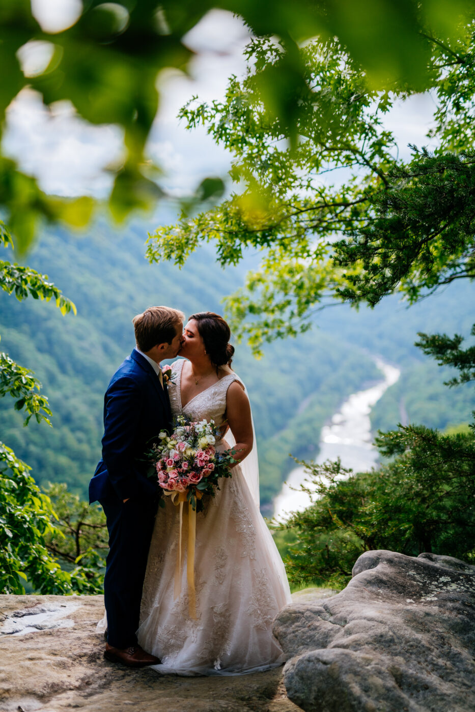 Diana and Ian share a kiss on Beauty Mountain during their elopement in Fayetteville, WV.