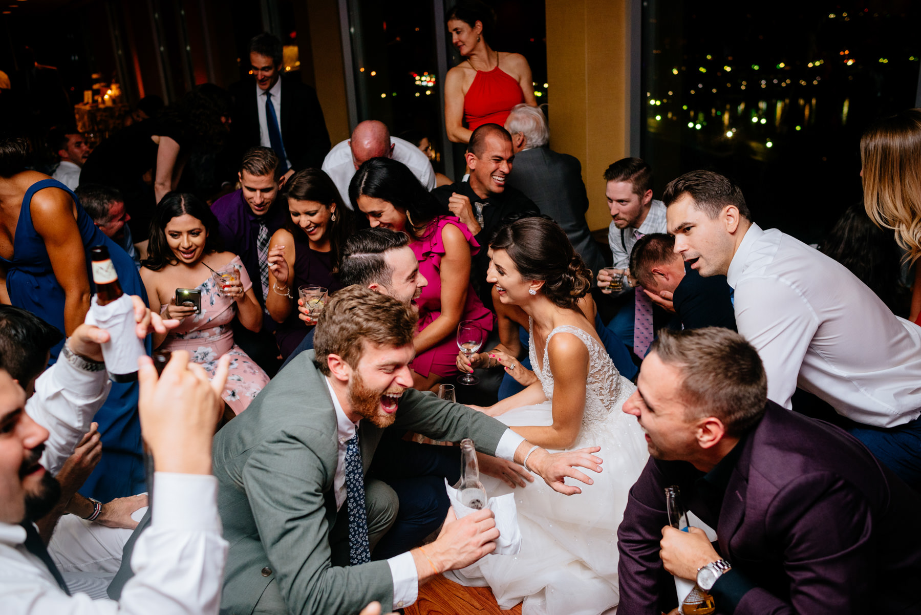 wedding guests dancing to shout