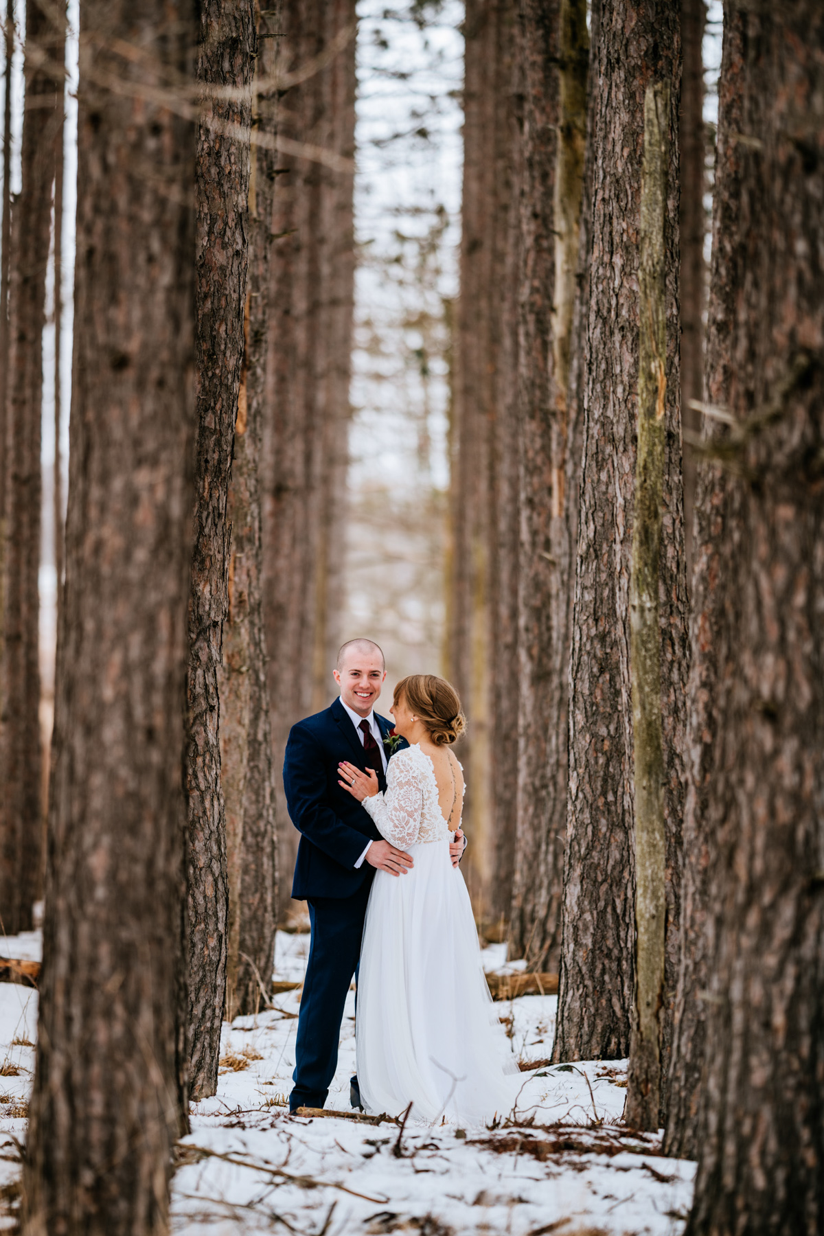 bride and groom snow forest wedding photos