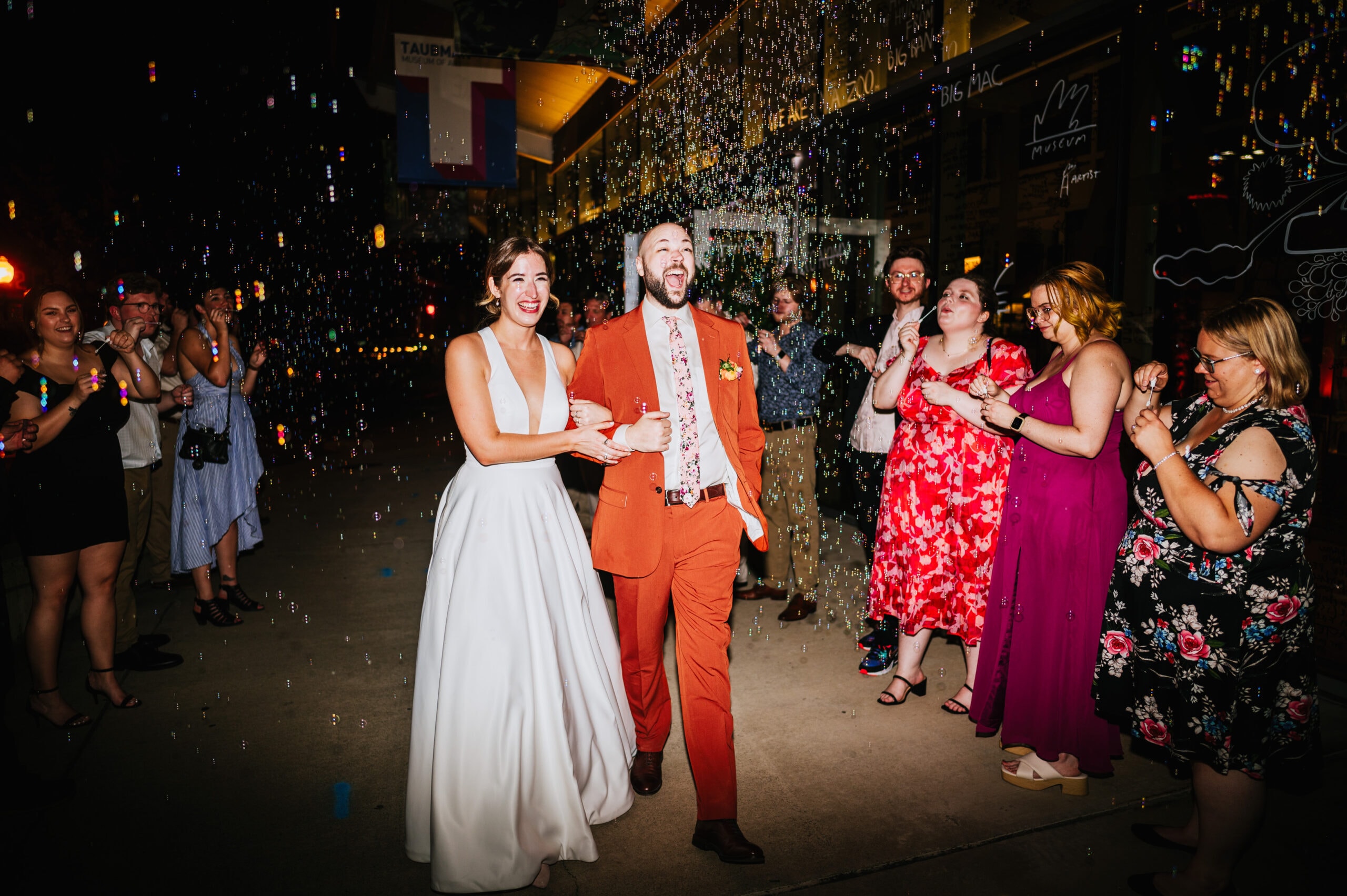 bride and groom bubble exit taubman museum of art wedding 