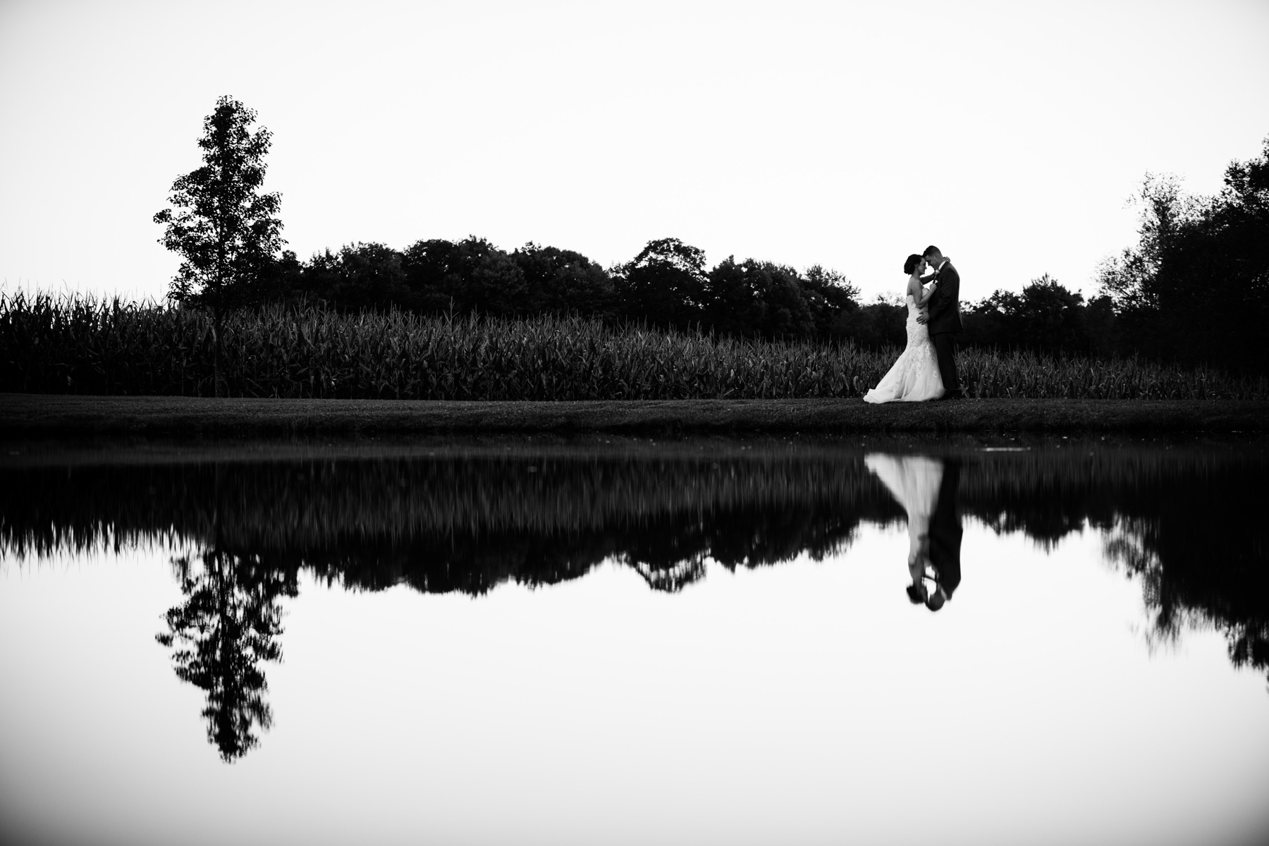 black and white creative reflection wedding portrait